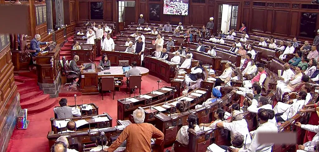 Opposition MPs protest over Manipur violence issue in the Rajya Sabha during the Monsoon session of Parliament, in New Delhi.