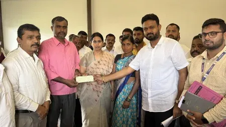 a-cheque-was-handed-over-by-minister-hebbalkar