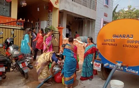 Water distribution through tankers by charitable women