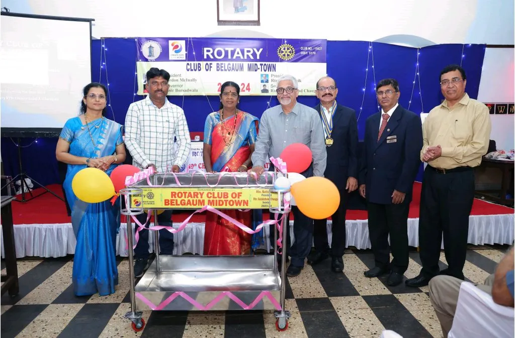Distribution of useful materials to the needy on the occasion of Golden Jubilee of Rotary Club