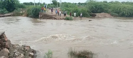 The bridge collapsed due to rain and communication was lost