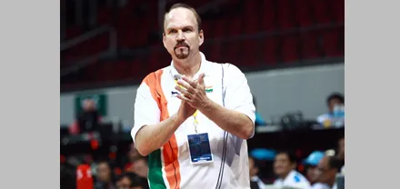 Fleming as the coach of the Indian basketball team