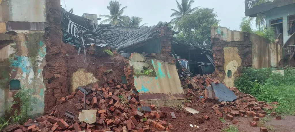 Damage to material due to collapse of house wall in Alwan Galli
