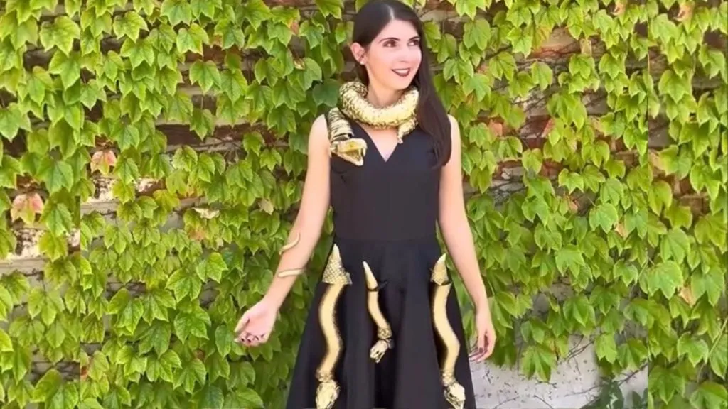 A robotic snake crawling on a dress