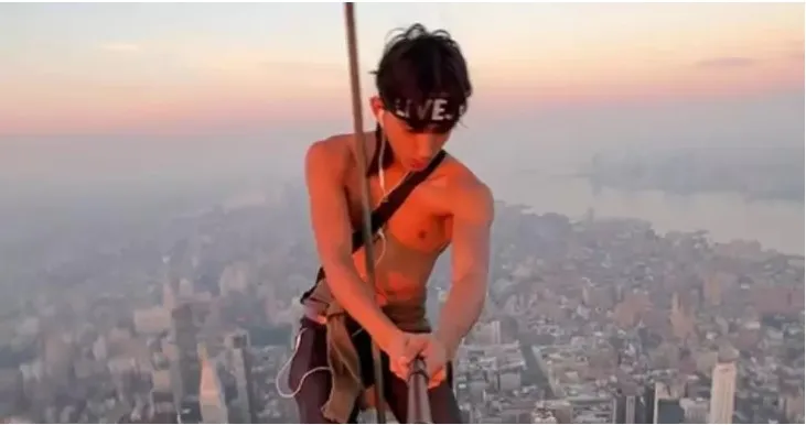 Selfie standing on top of 102-storey building