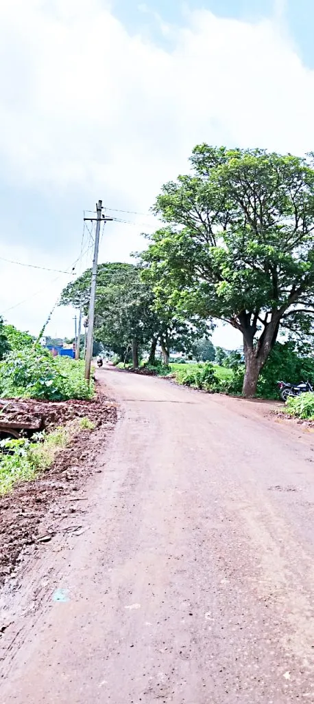 Repair of potholed road by Kangrali Budruk Gram Panchayat