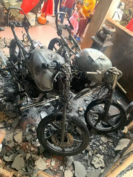 Two-wheelers parked in front of the house caught fire