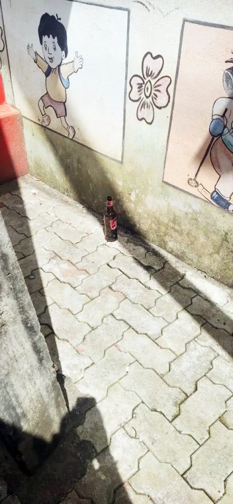 Type of Liquor Bottle Dropping in Basarikatti Anganwadi Premises