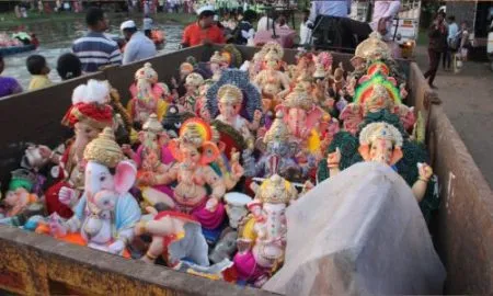 Ganesha idols immersed in the environment