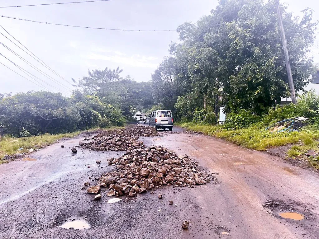 Potholes on Yelloor-Sulga-Rajhansgarh road were patched by a social worker