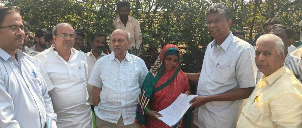 Distribution of financial assistance order letter to the wife of the late Laxman Ambli