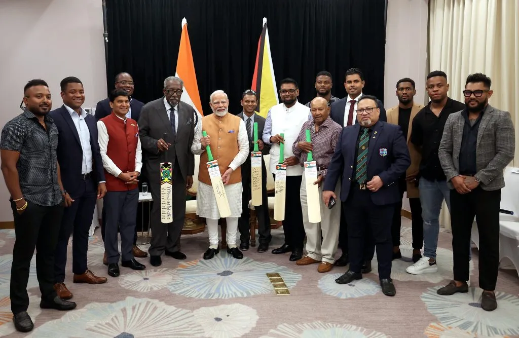 Narendra Modi interacts with Guyana's cricket legends
