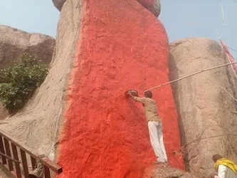 A temple without a priest...but still a queue of devotees