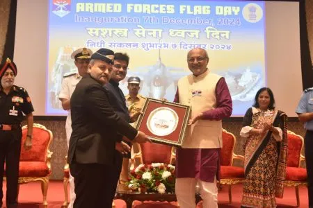 Governor felicitates District Collector Shinde