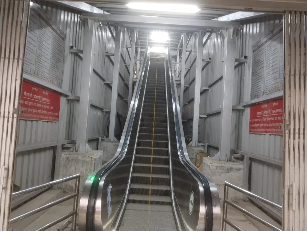 The escalator is less open, more closed.