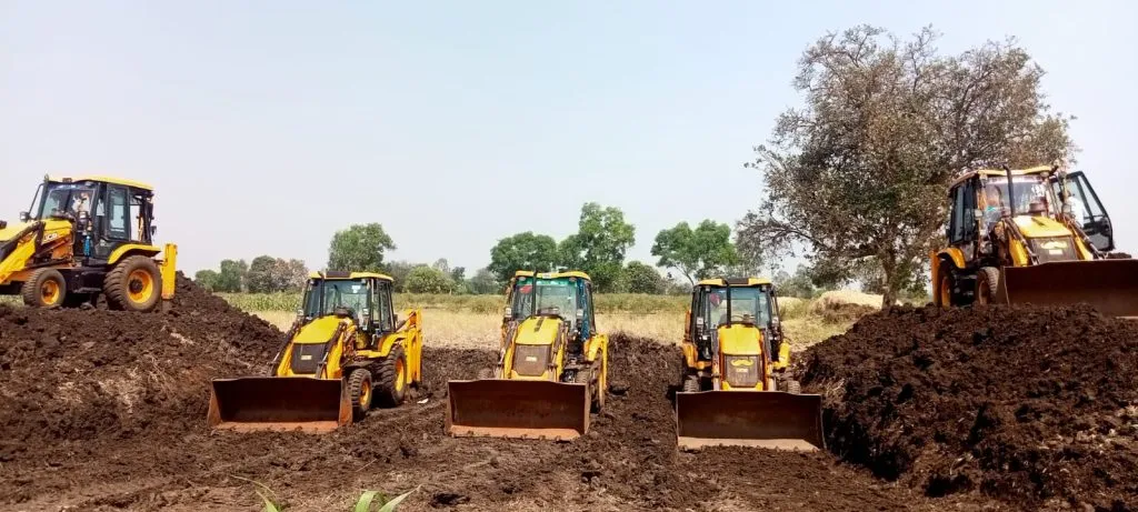 Construction of electricity tower in fertile lands