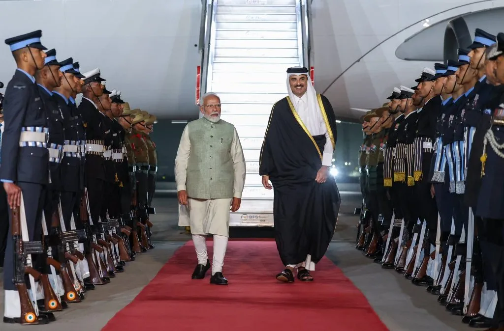 Modi welcomes Qatari Emir at the airport