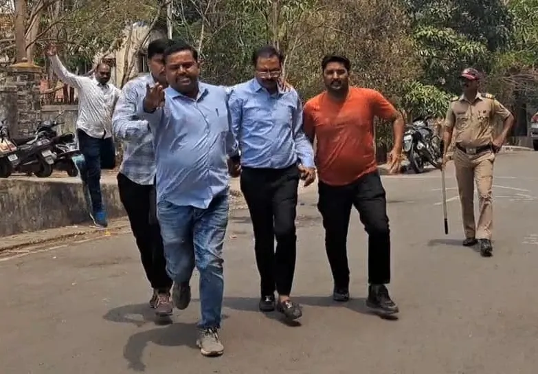 Forensic Team Arrives to Collect Koratkar's Voice Sample