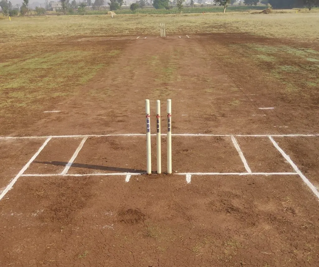 Construction of a cricket ground in Pirwadi