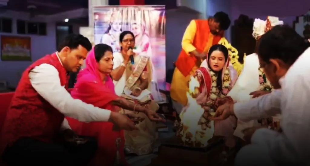 Female priest performing the last rites