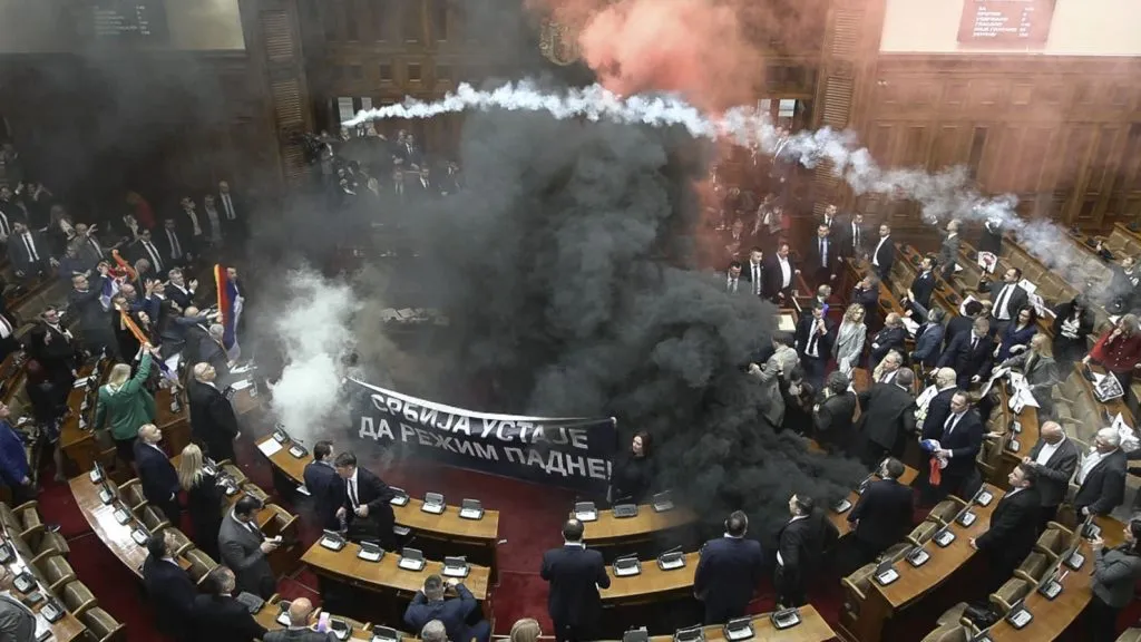 MPs throw smoke grenades at Serbian parliament