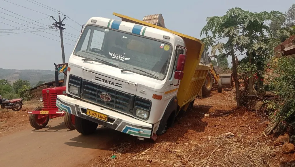 Dump Truck Stuck in Road Excavation by Telecom Company