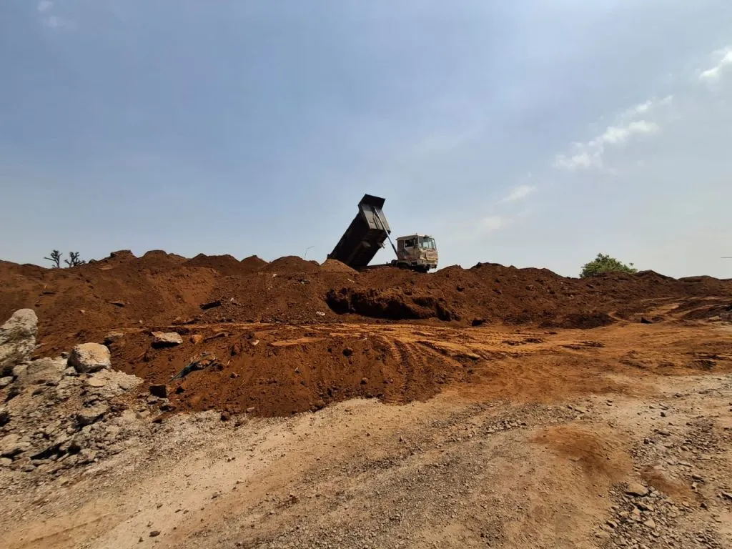 Earth fill at the flood level of the Vashishti River