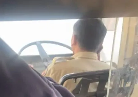 "Bus driver on mobile; passenger safety at risk