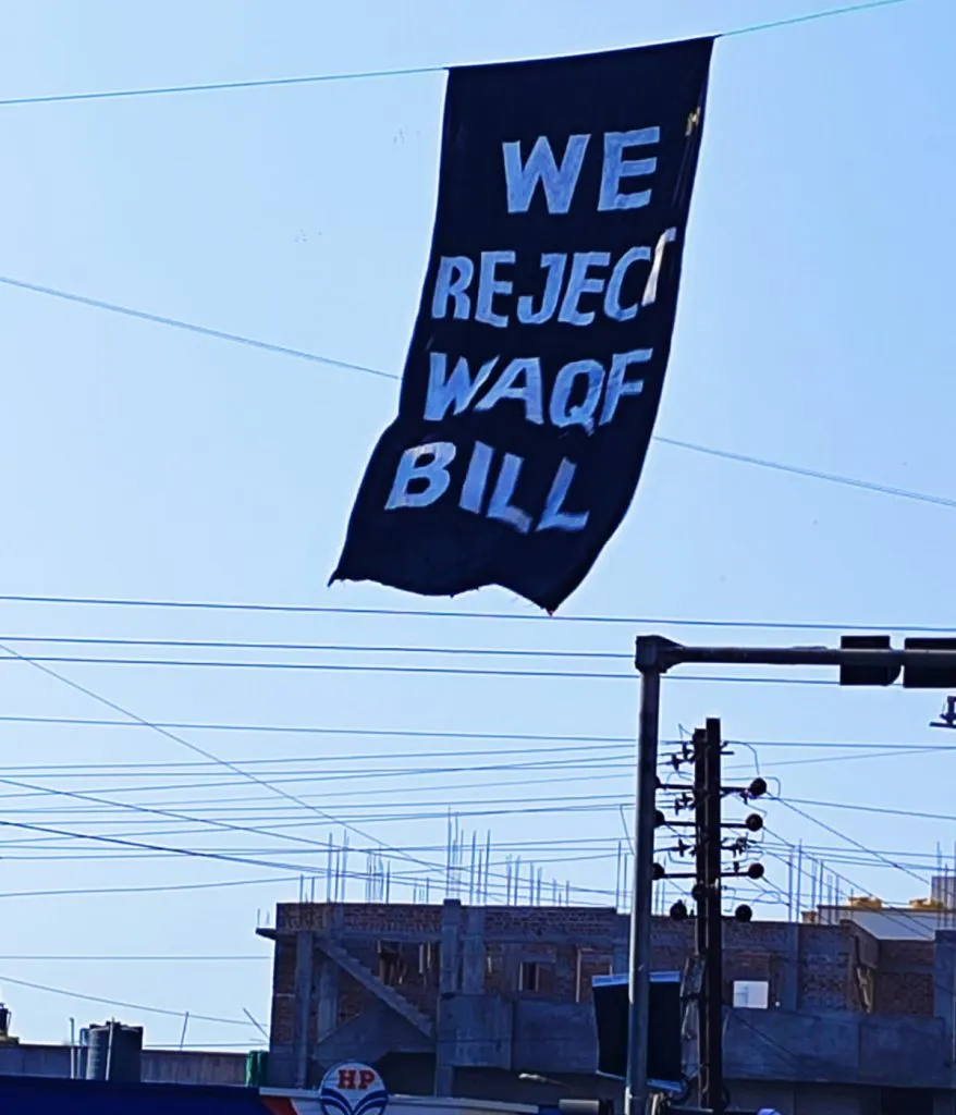putting up banners on traffic signals