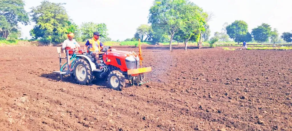 Rice sowing with the help of tractor in Dhamane Shivara