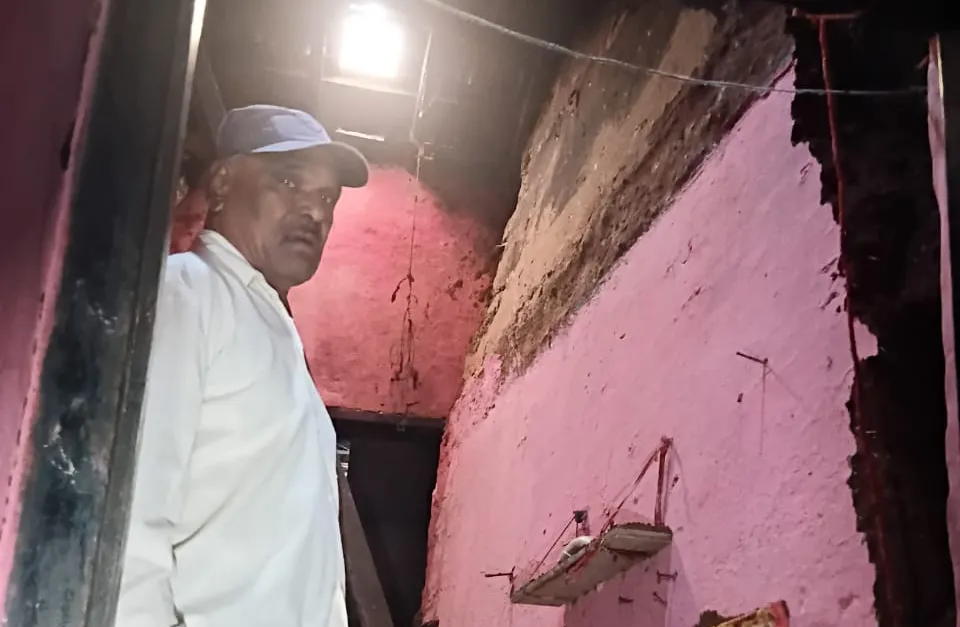 Damage caused by collapse of wall of house in Old Gandhinagar