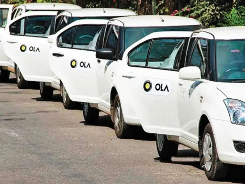 What is Ola's zero commission model?