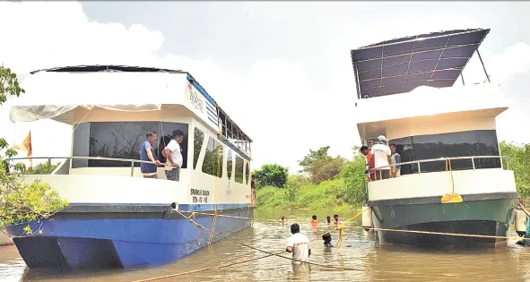 All Three Houseboats Have Reached the Shore