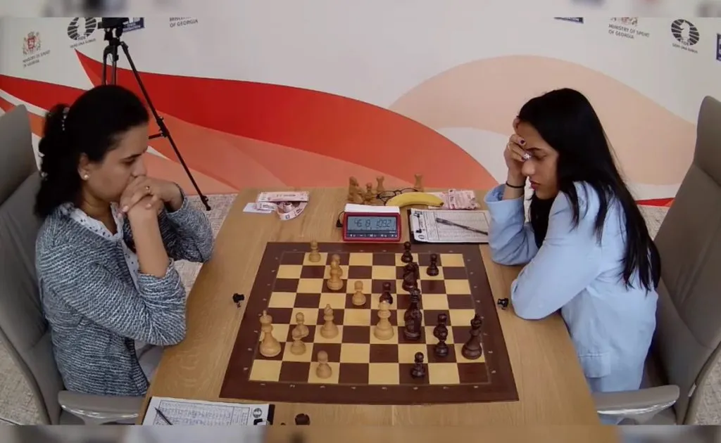 Divya holds Humpy to a draw