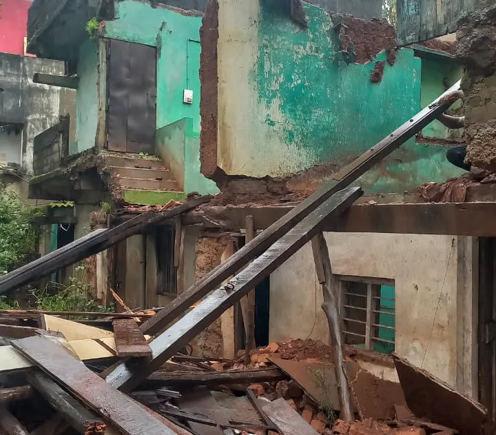 Damage caused by wall collapse due to rain in Patil's farm