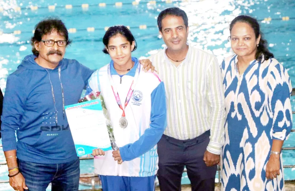 Nidhi shines in swimming competition