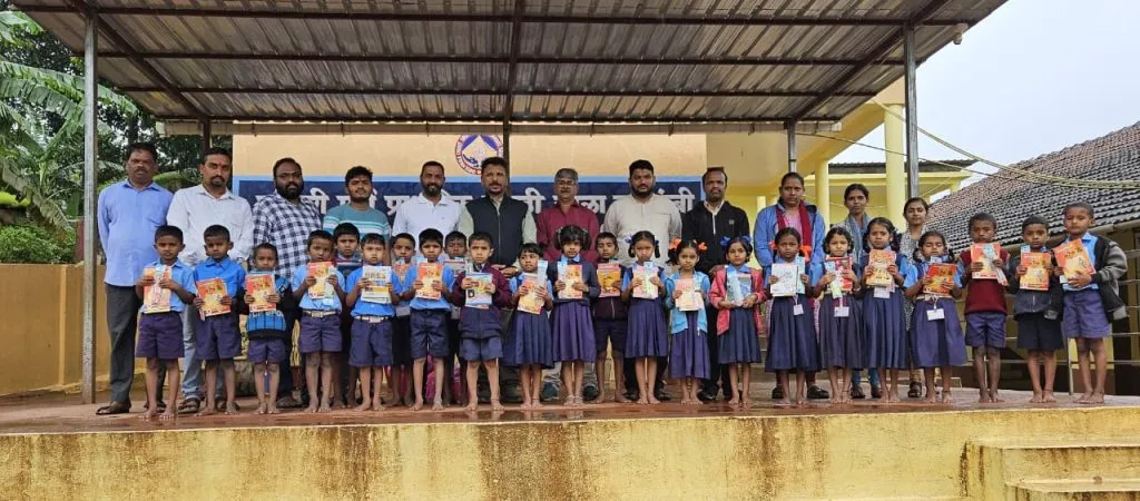 Distribution of educational materials by the Youth Committee in Khanapur taluka