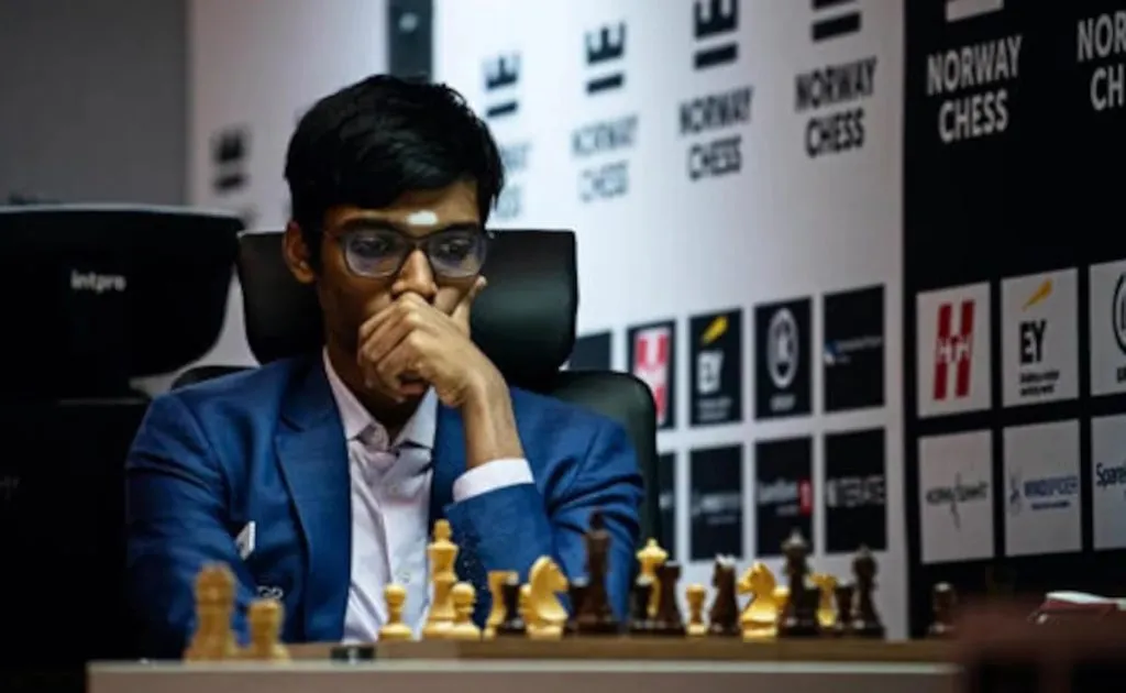 Praggnanandhaa takes joint lead after easy win, Gukesh loses
