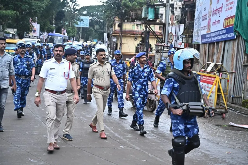 Rapid Action Force parades along the immersion procession route