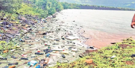 Stockpile of plastic waste in Mahua Dam