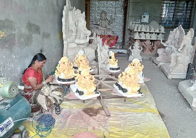 Final touches being given to Ganesh idols by artisans from Dhagewadi