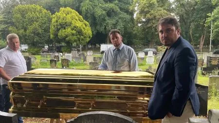 Funeral procession in a pure gold coffin, Rolls Royce car
