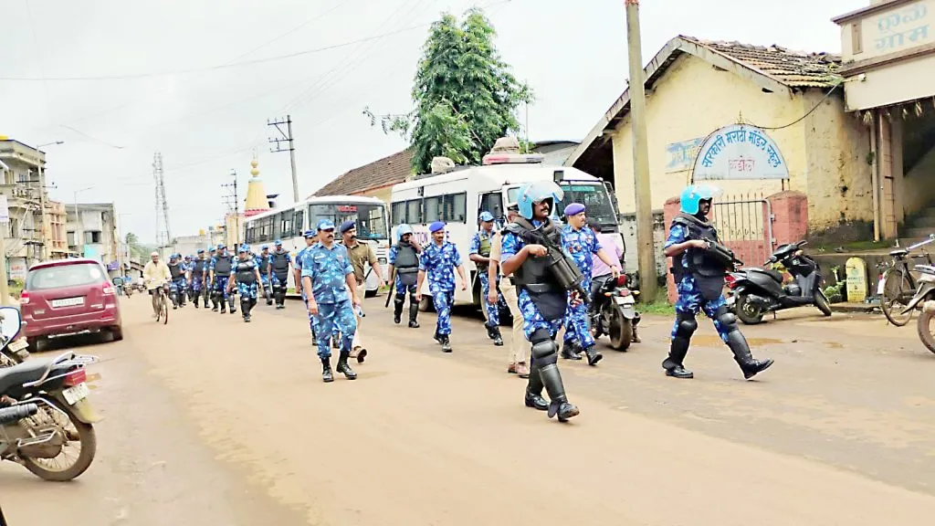 Kadoli Police Department-Rapid Action Force personnel conduct a roadshow