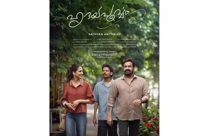 Mohanlal and Malvika in 'Hridaypoorvam'