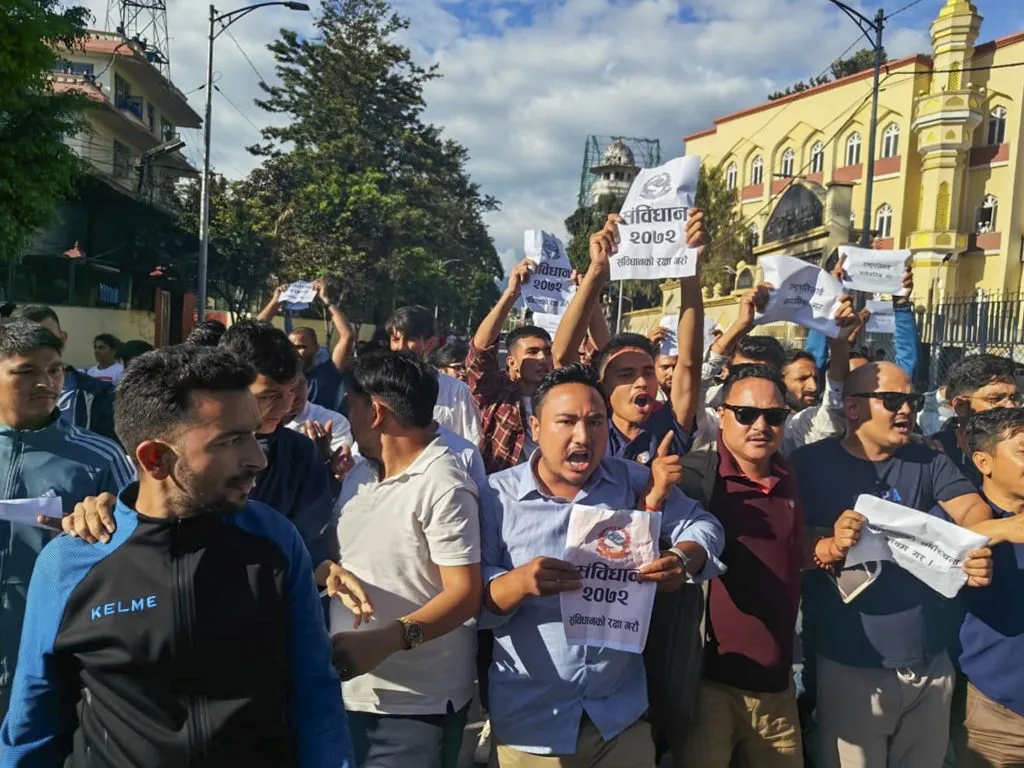 Argument among protesters over choice of leader